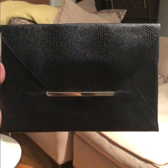 BCBGMaxAzria Handbags - Black stunning clutch NEW BCBGMaxAzria Handbags - Black stunning clutch NEW
